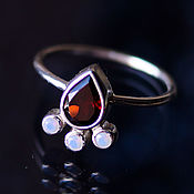 Украшения handmade. Livemaster - original item Neat silver ring with garnet and opals. Handmade.