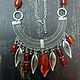 Necklace and earrings made of natural stones ethnic design Eden Gardens. Bright red-orange range. 
Clothing in Bohemian style, country style, denim style.