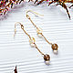 Long earrings with citrine and rauchtopaz
