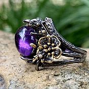Sold. Large silver ring with amethyst, p. .17,5,