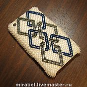Decoration of beads and stones. embroidered pendant. Bead embroidery