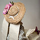Шляпка из джутового шнура. Лепестки цветка собраны в  цветок из атласных лент, покрашены вручную.