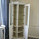 Corner Cabinet-cupboard. Has six sections with shelves for storage. Shelves behind glass doors glass handling euroedge.