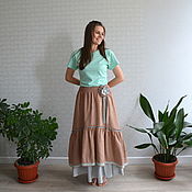 The floor-length skirt 