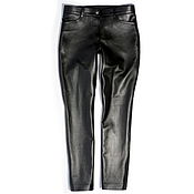 Leather pants with asymmetric seams