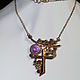 pendant on a chain `Cross` with natural stones: amethyst, green (tsavorite) and red garnet
