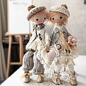 Product where the. Collectible doll in beige and coffee tones. Boho style