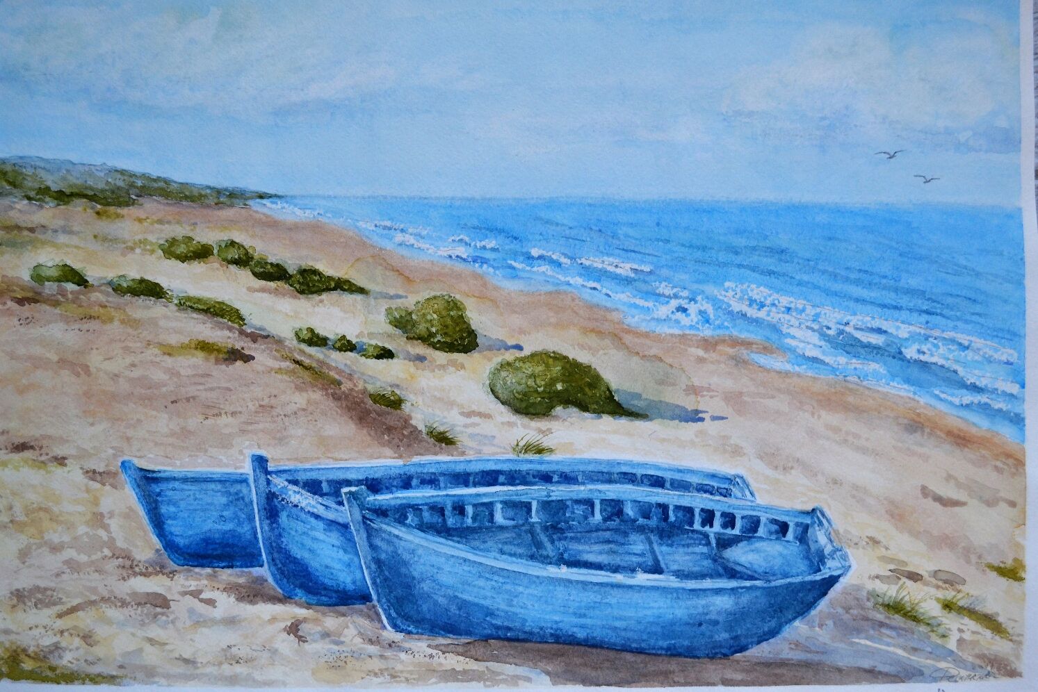 Картина лодки на песке