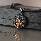 Pendant on a leather cord - Golden Dragon