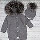 Knitted children's jumpsuit with fur