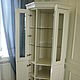 Corner Cabinet-cupboard. Has six sections with shelves for storage. Shelves behind glass doors glass handling euroedge.