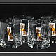 Набор для виски 42495 `Тигровый глаз` (4 стакана) Инкрустирован кристаллами из хрусталя 5мм. Preciosa (Чехия), и кабошона 10*10мм  (природный минерал `Тигровый глаз`). Упакован в коробку `Престиж`.