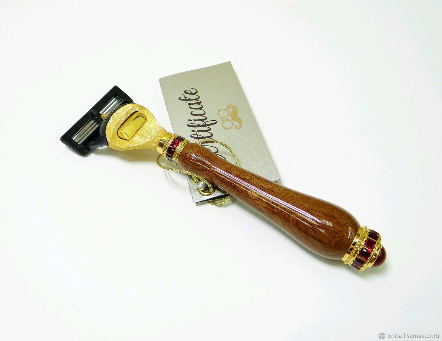 Expensive men's gift shaving machine, hand made natural iron wood. Mechanism and accessories razor is made of jewelry of bronze and gold - 24kt.
