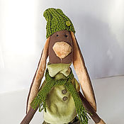 Textile doll with removable clothing